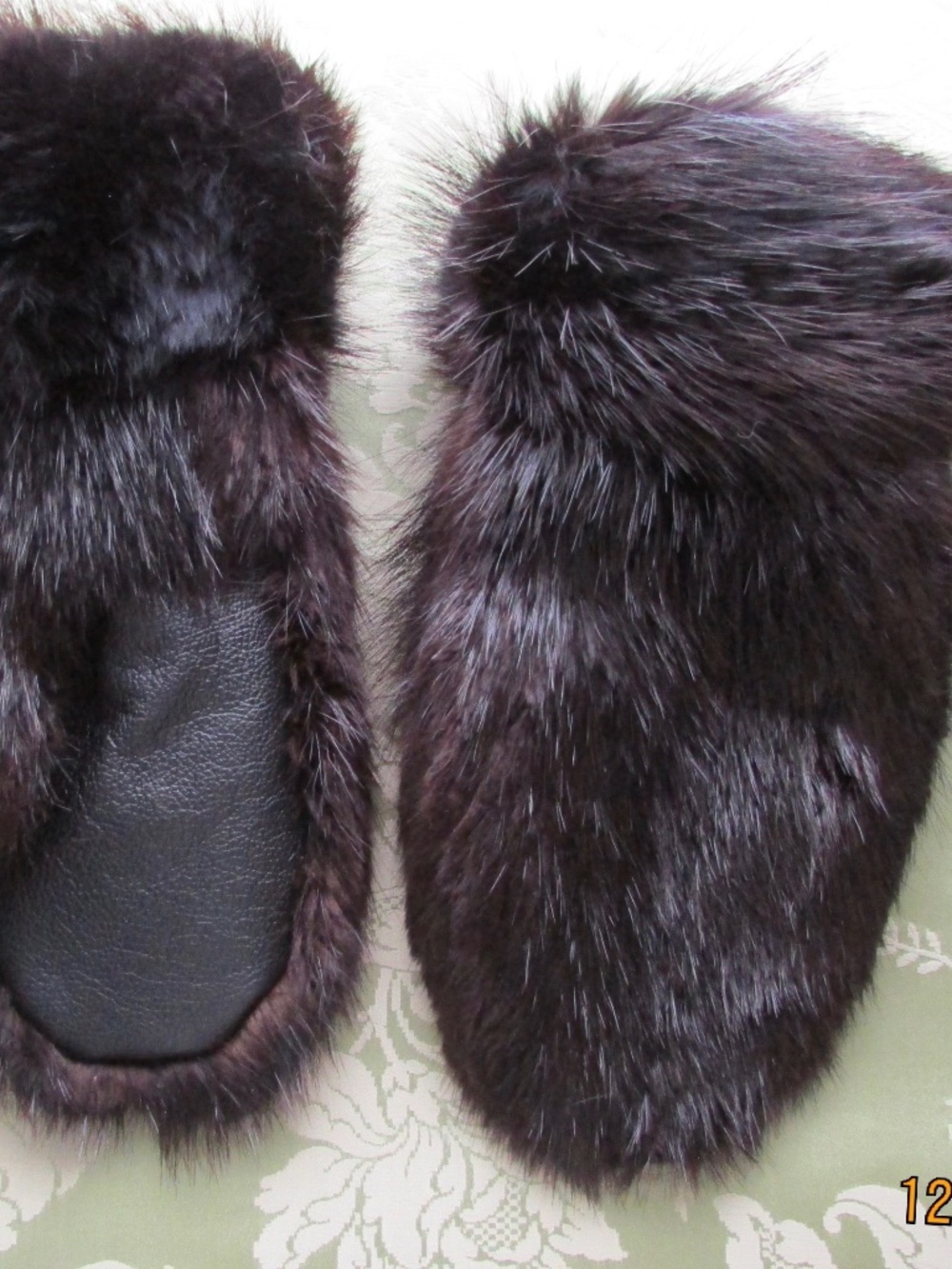 Mittens made from natural black beaver fur.